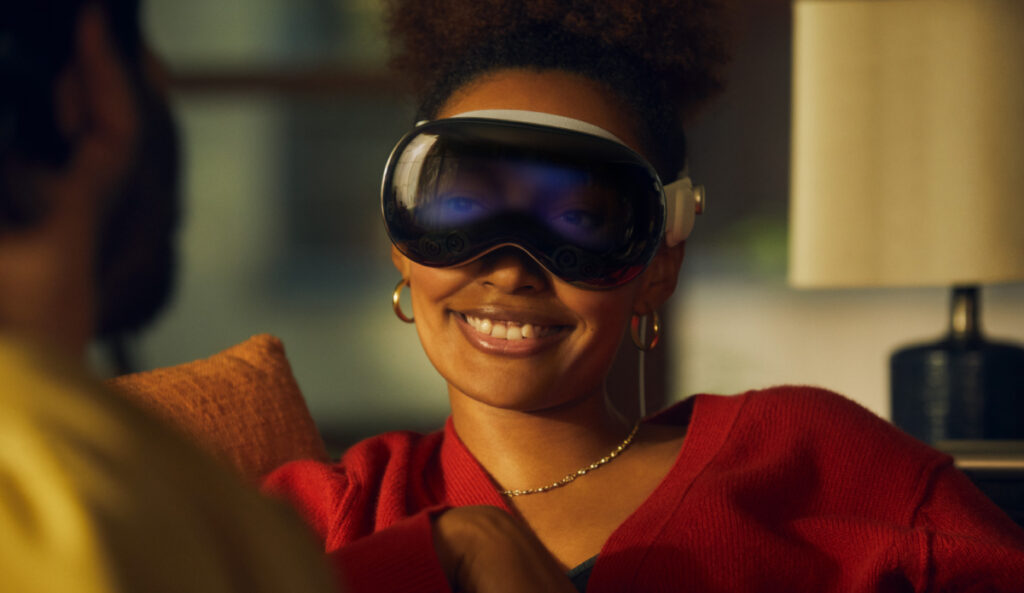 woman smiling wearing apple headset